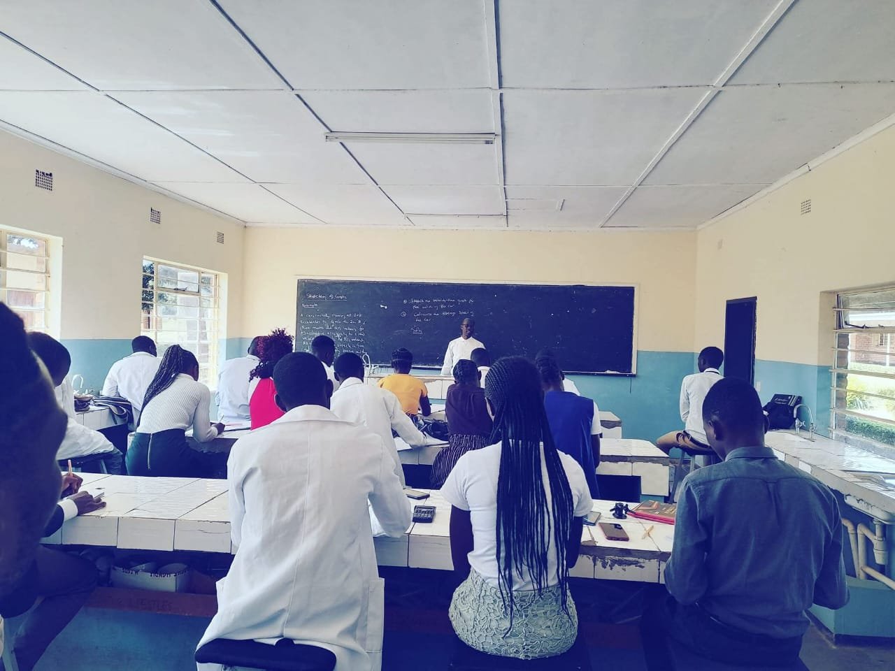 Students in a science laboratory classroom at St. Mary's College of Education